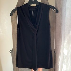 Black tank top with a tie down the front.